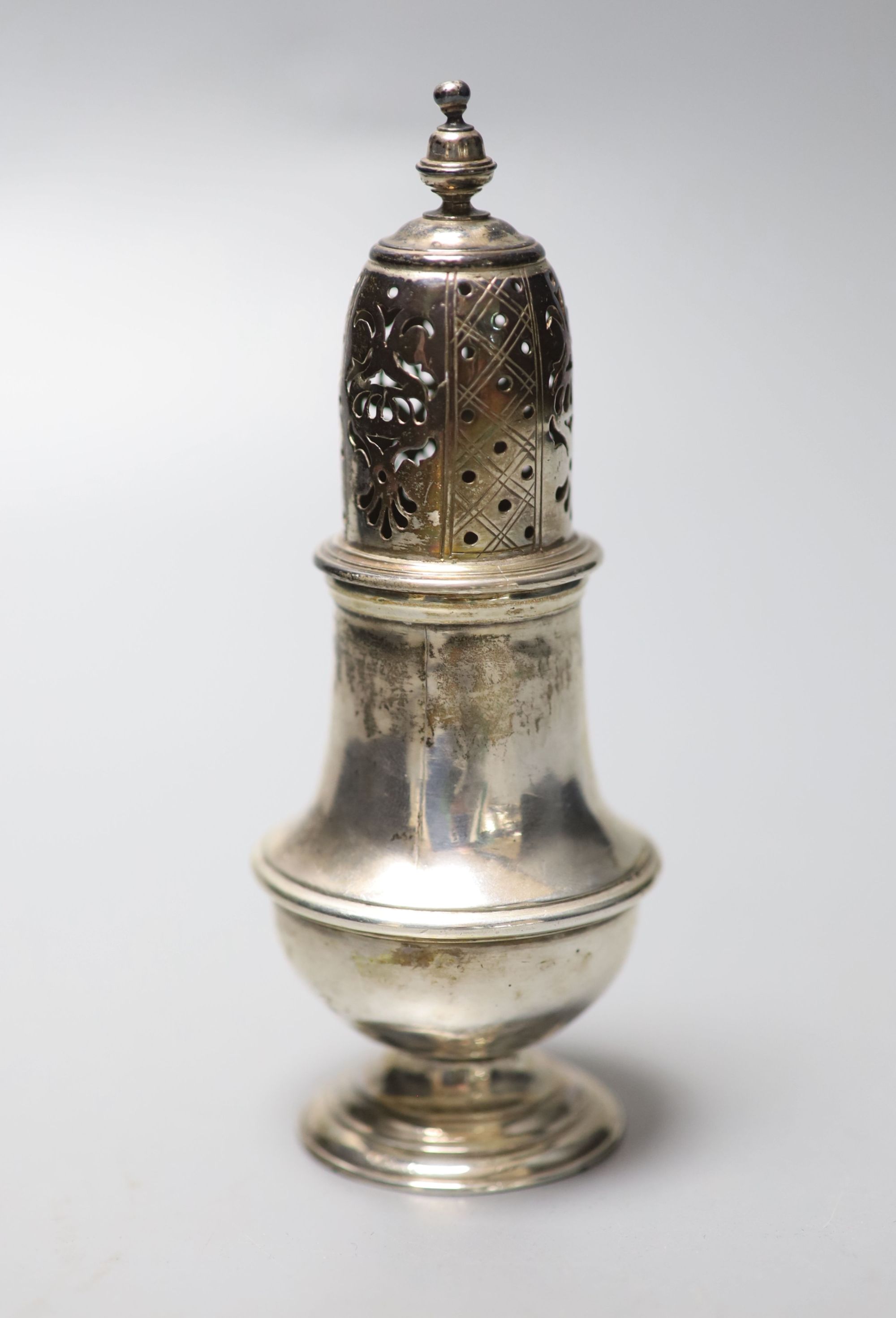 An 18th century Irish silver caster, marks rubbed, maker possibly William Townsend (1726-1775), 13.5cm, 3.5oz.